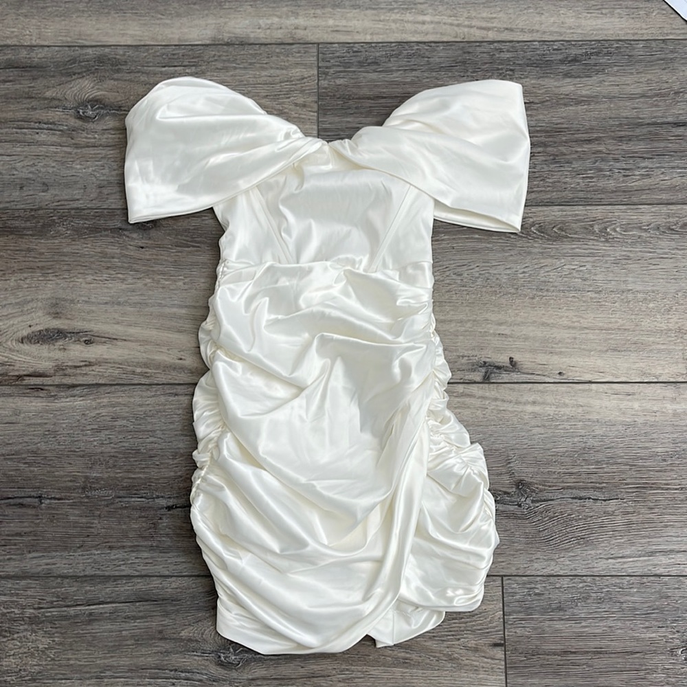 Brand new never before worn white off the shoulder mini dress